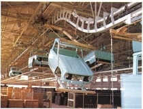 Ceiling-mounted conveyor for automobile plants